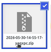 Zaznaczony plik ZIP w bibliotece mediów z niebieską ramką i ptaszkiem